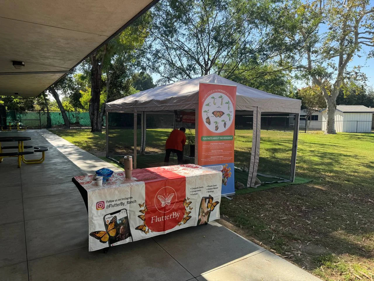 The exhibit under a shaded walkway at a public park